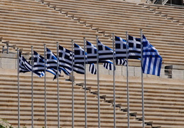 Greek flags fly over the Panathenaic Stadium